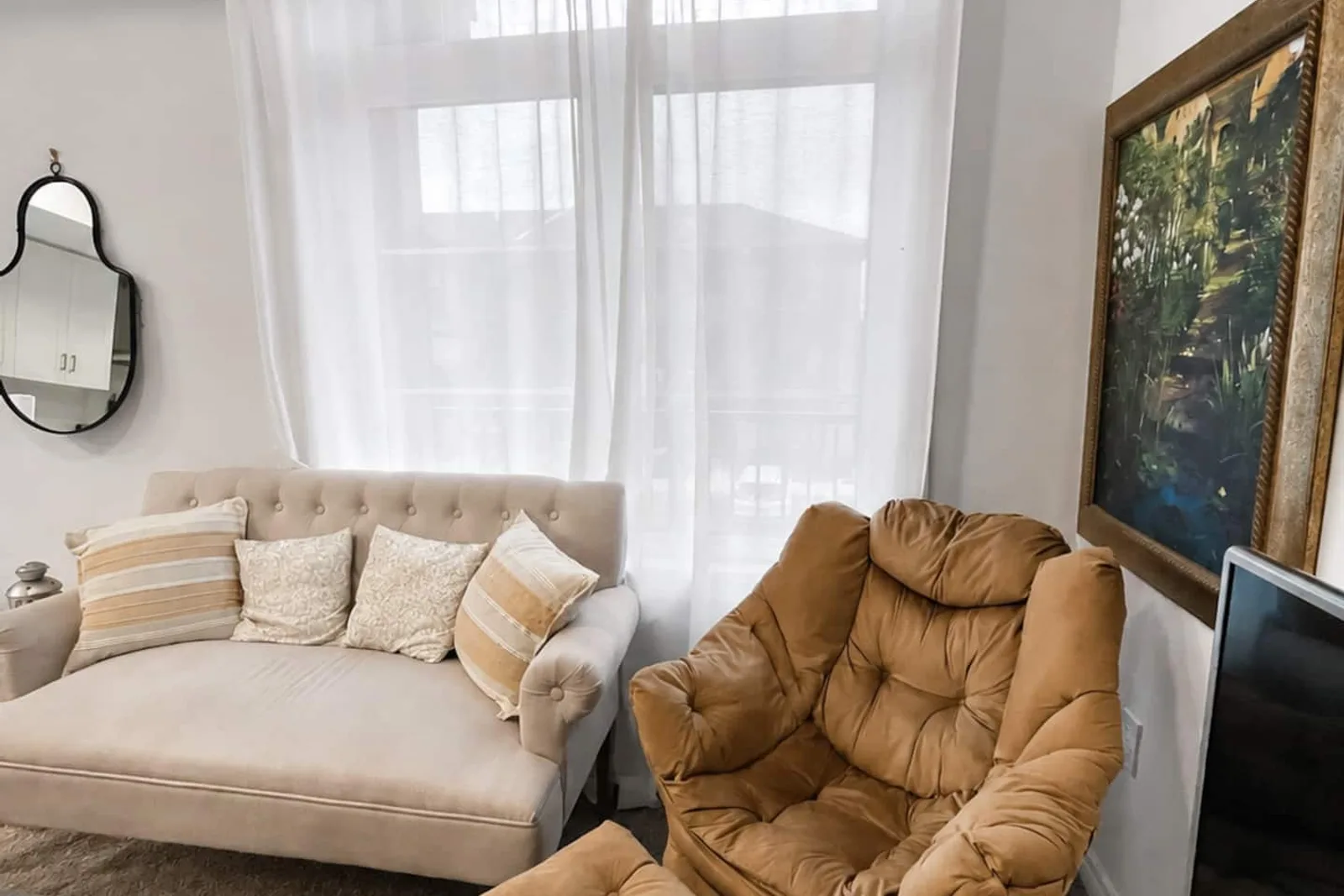 Living and dining area on the main level of the townhome